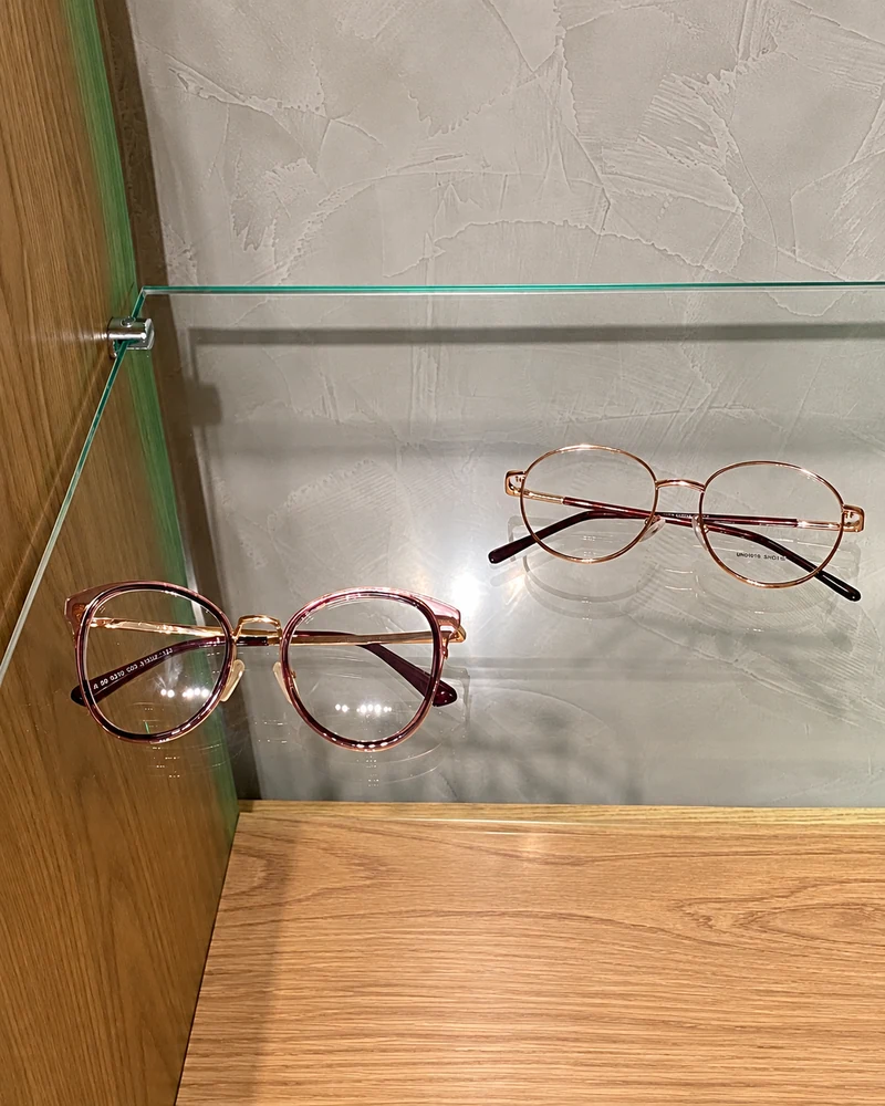 Armações de grau arredondadas em acetato lilás e metal rosé